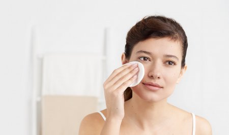 Bioderma - woman cleansing her face