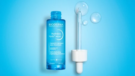 bottle of Hydrabio Hyalu+serum with eyedropper containing liquid